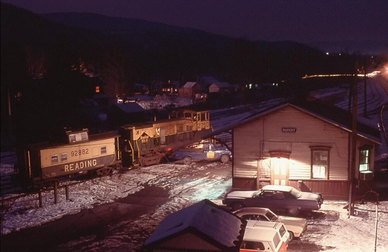 An SW-1500 gets some TLC on a snowy night at Rupert, PA on the Catawissa Branch.  This was an interchange point between the Reading and the DL&W, later Erie-Lackawanna.  Photo courtesy Jim Gerofsky.